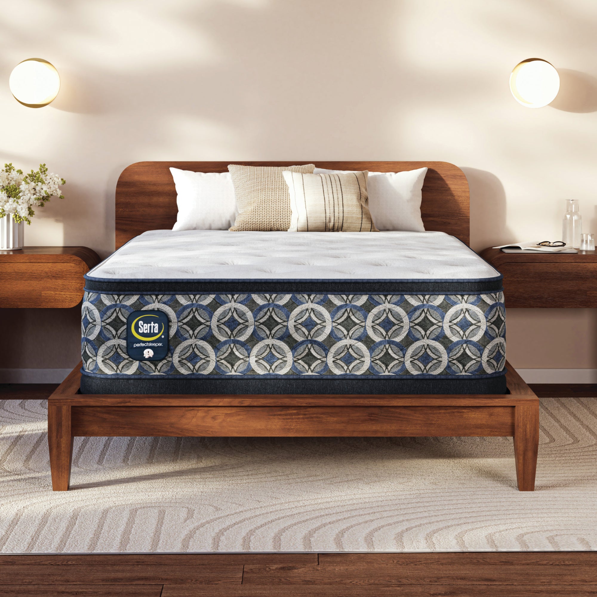 Serta perfect sleeper plush mattress on a wooden bed frame in a bedroom setting